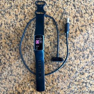 Fitbit Charge 5 with black band and charger - used in excellent condition